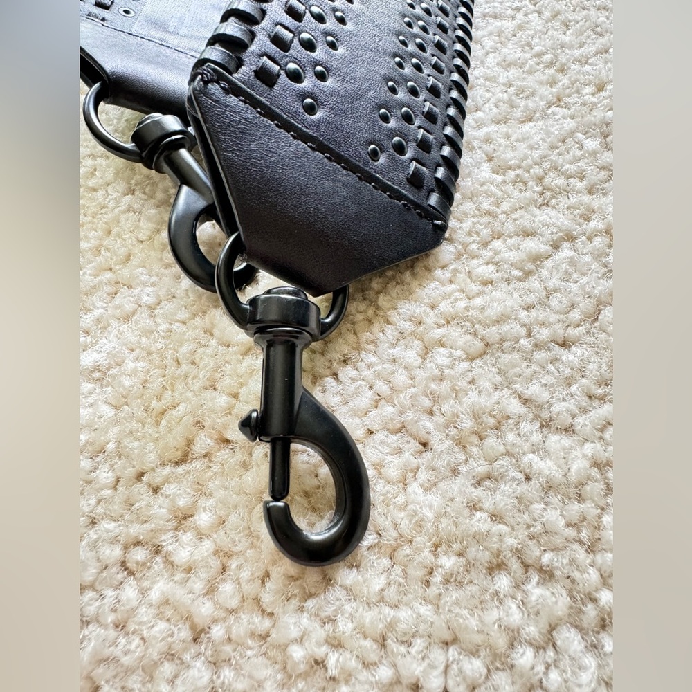 Ribecca Mincoff handbag’s wide strap